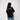 Person wearing a black t-shirt with 'JEREMIAD' printed on the back against a white background