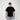Man wearing a black t-shirt with a small white logo on a plain background